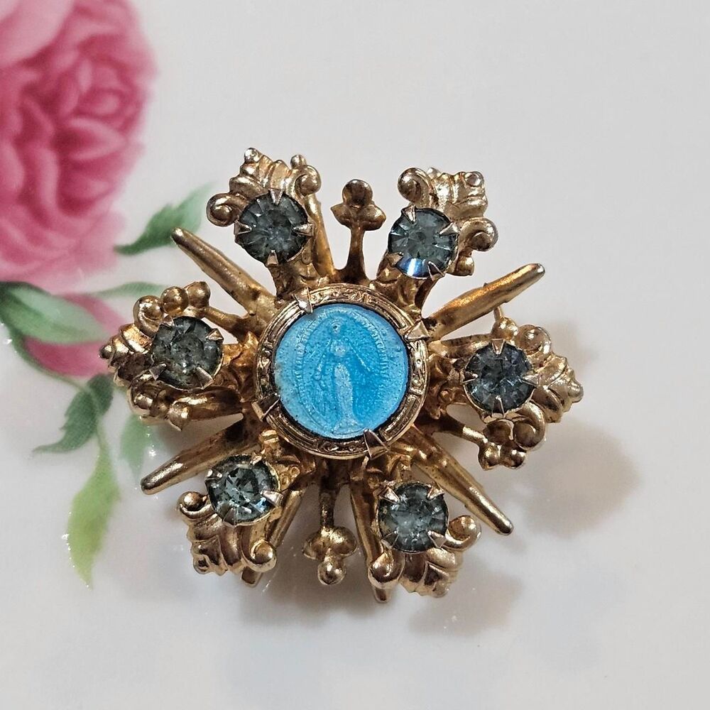 50s blue Virgin Mary gold tone starburst brooch